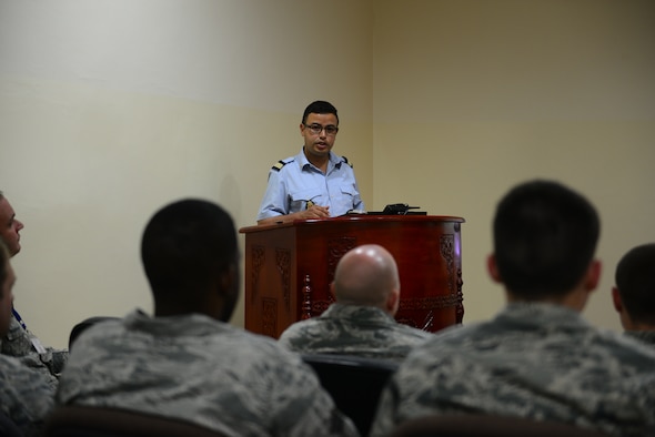 A Royal Moroccan Air Force officer teaches a history and cultural class to U.S. Air Force Airmen during Exercise African Lion at Ben Guerir Air Base, Morocco, May 19, 2015. This class included important events in RMAF history and lessons on cultural traditions and sensitivities. African Lion is a joint coalition exercise led by U.S. Marine Forces Europe and Africa with a mission of building partnerships and maximizing interoperability with allies. (U.S. Air Force photo by Staff Sgt. Eboni Reams/Released)