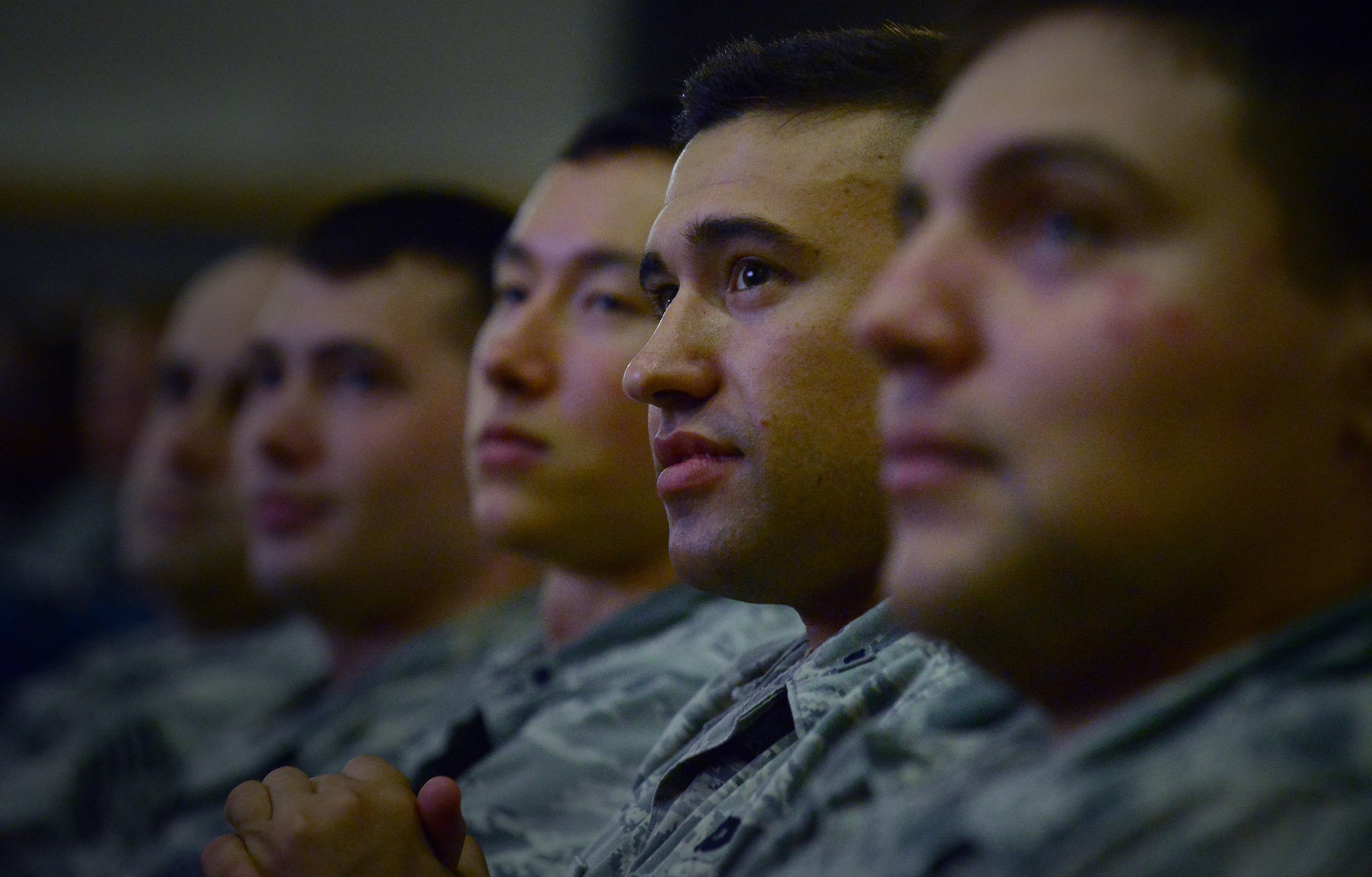 Airmen from the 8th Mission Support Group listen to Col. Jeremy “Wolf” Sloane, 8th Fighter Wing commander, as he speaks during a commander’s call at Kunsan Air Base, Republic of Korea, May 22, 2015. Sloane discussed the importance of developing better Airmen, training replacements and building upon the U.S. and ROK alliance by being good neighbors and responsible members of the community. (U.S. Air Force photo by Staff Sgt. Nick Wilson/Released)