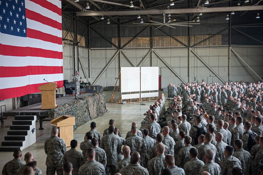 Col. Jeremy “Wolf” Sloane, 8th Fighter Wing commander, addresses 8th Maintenance Group Airmen during a commander’s call at Kunsan Air Base, Republic of Korea, May 22, 2015. Sloane outlined expectations for Kunsan Airmen and the necessity for combat readiness during his first round of commander’s calls as Wolf 55. (U.S. Air Force photo by Senior Airman Katrina Heikkinen/Released)