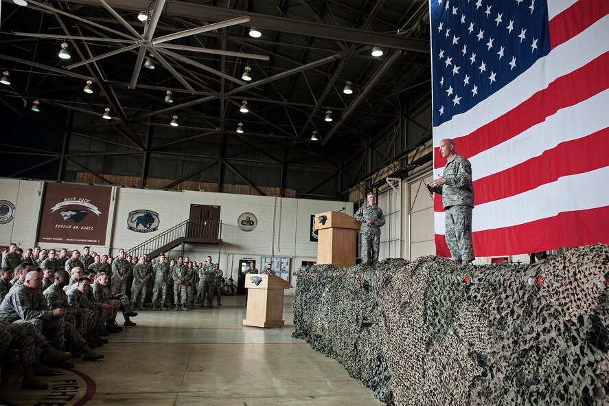 Chief Master Sgt. Daniel “Wolf Chief” Simpson, 8th Fighter Wing command chief, addresses 8th Maintenance Group Airmen during a commander’s call at Kunsan Air Base, Republic of Korea, May 22, 2015. Wolf Chief and Col. Jeremy “Wolf” Sloane, 8th FW commander, stressed the necessity for combat readiness and strengthening relationships during their first round of all-calls with the Wolf Pack. (U.S. Air Force photo by Senior Airman Katrina Heikkinen/Released)