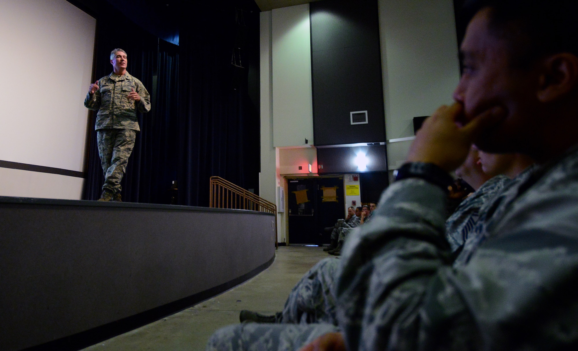Col. Jeremy “Wolf” Sloane, 8th Fighter Wing commander, addresses Wolf Pack Airmen during a commander’s call at Kunsan Air Base, Republic of Korea, May 22, 2015. Sloane discussed high expectations for combat readiness on the Korean Peninsula and spoke on the importance of remaining physically and mentally prepared to carry out the mission at all times. (U.S. Air Force photo by Staff Sgt. Nick Wilson/Released)