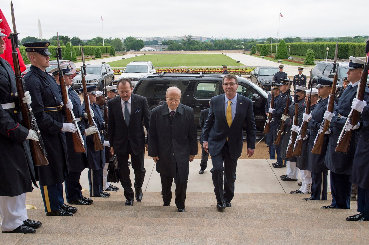 U.S. Defense Secretary Ash Carter, right, welcomes Tunisian President Beji Caid Essebsi to the Pentagon, May 21, 2015. The two leaders met to discuss matters of mutual importance. DoD photo by U.S. Air Force Master Sgt. Adrian Cadiz