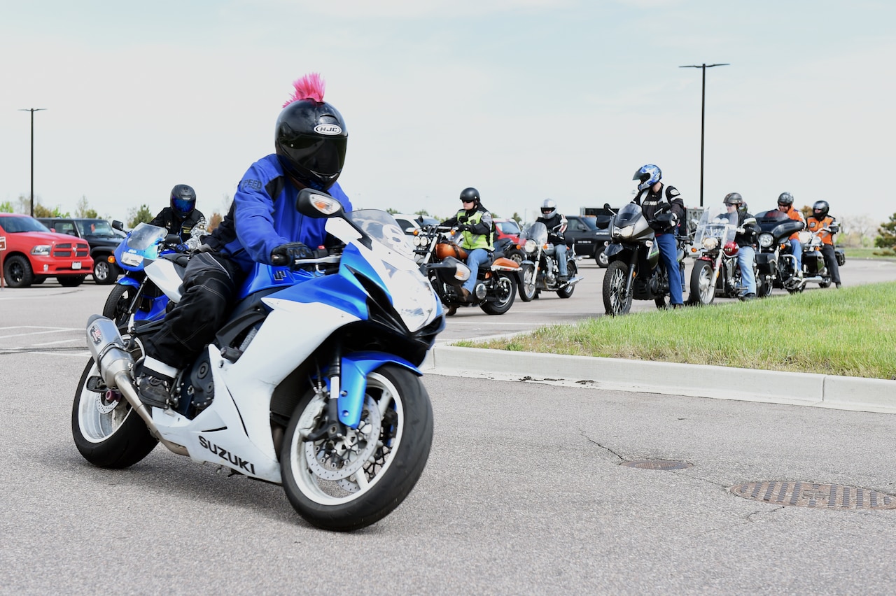 Motorcyclists start a safety ride at Buckley Air Force Base, Colo., May 15, 2015. The 460th Space Communications Squadron sponsored motorcycle safety training and the ride to teach its young members how to ride safely. U.S. Air Force photo by Airman 1st Class Emily E. Amyotte
