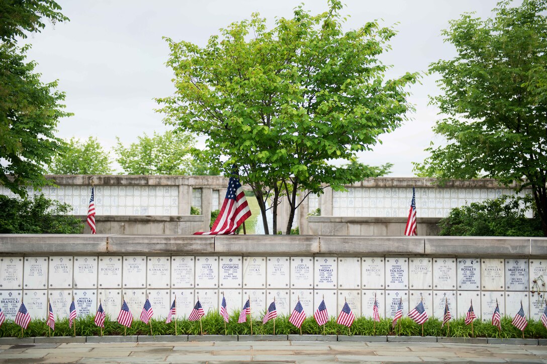 American flags that soldiers placed during "Flags In" line the Columbarium at Arlington National Cemetery in Arlington, Va., May 21, 2015. 