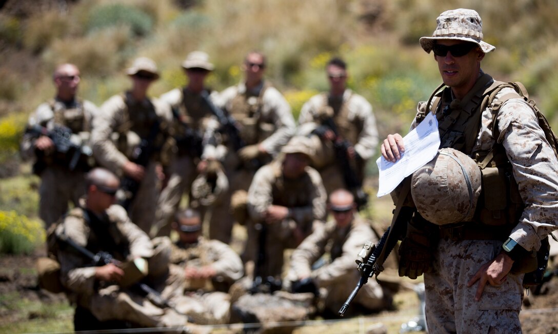 U.S. Marine Corps Capt. Francisco J. " Vince " Vega briefs Marines before a company-sized assault on Range 10 during Operation Lava Viper at Pohakuloa Training Area, Hawaii, May 21, 2015. Vega is the 1st Battalion, 3rd Marines, Alpha Company commanding officer. 