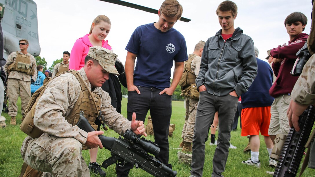 Cranford, N.J., residents joined Marines with 1st Battalion, 6th Marine Regiment, in an aerial landing event as part of Fleet Week New York, May 21, 2015. Marines with Special-Purpose Marine Air Ground Task Force-New York showcase the capabilities of the Marine Corps both physically, mentally and technologically during Fleet Week New York. Fleet Week is an annual event that provides New York and surrounding area a chance to see the sea services capabilities.