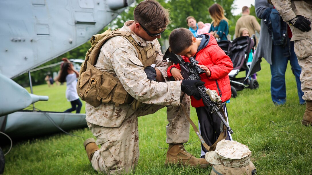 Cranford, N.J., residents joined Marines with 1st Battalion, 6th Marine Regiment, in an aerial landing event as part of Fleet Week New York, May 21, 2015. Marines with Special-Purpose Marine Air Ground Task Force-New York showcase the capabilities of the Marine Corps both physically, mentally and technologically during Fleet Week New York. Fleet Week is an annual event that provides New York and surrounding area a chance to see the sea services capabilities.