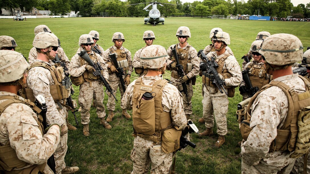 Marines with 1st Battalion, 6th Marine Regiment, review their performance during an aerial landing event as part of Fleet Week New York, May 21, 2015. Marines with Special-Purpose Marine Air Ground Task Force-New York showcase the capabilities of the Marine Corps both physically, mentally and technologically during Fleet Week New York. Fleet Week is an annual event that provides New York and surrounding area a chance to see the sea services capabilities.