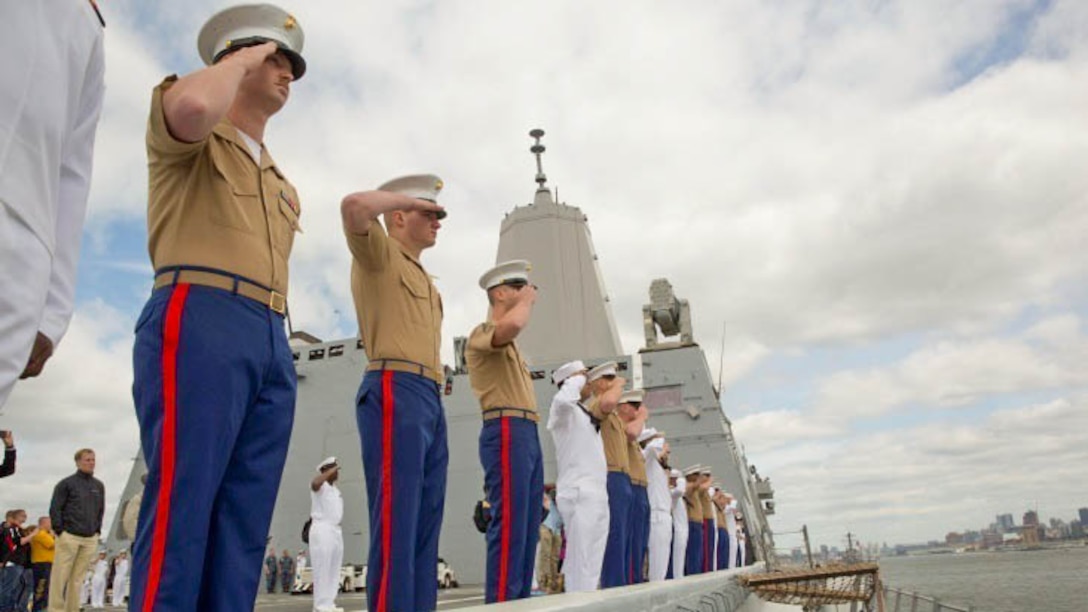 Marines and sailors man the rails as the USS San Antonio makes its final approach into New York, May 20, 2015. Approximately 1,800 Marines, sailors and Coast Guardsmen participate in this year’s annual Fleet Week New York, May 20-26, 2015. Fleet Week provides the people of New York and surrounding area a chance to see the capabilities of the sea services, as well getting the opportunity to meet the Marines, sailors and Coast Guardsmen. 