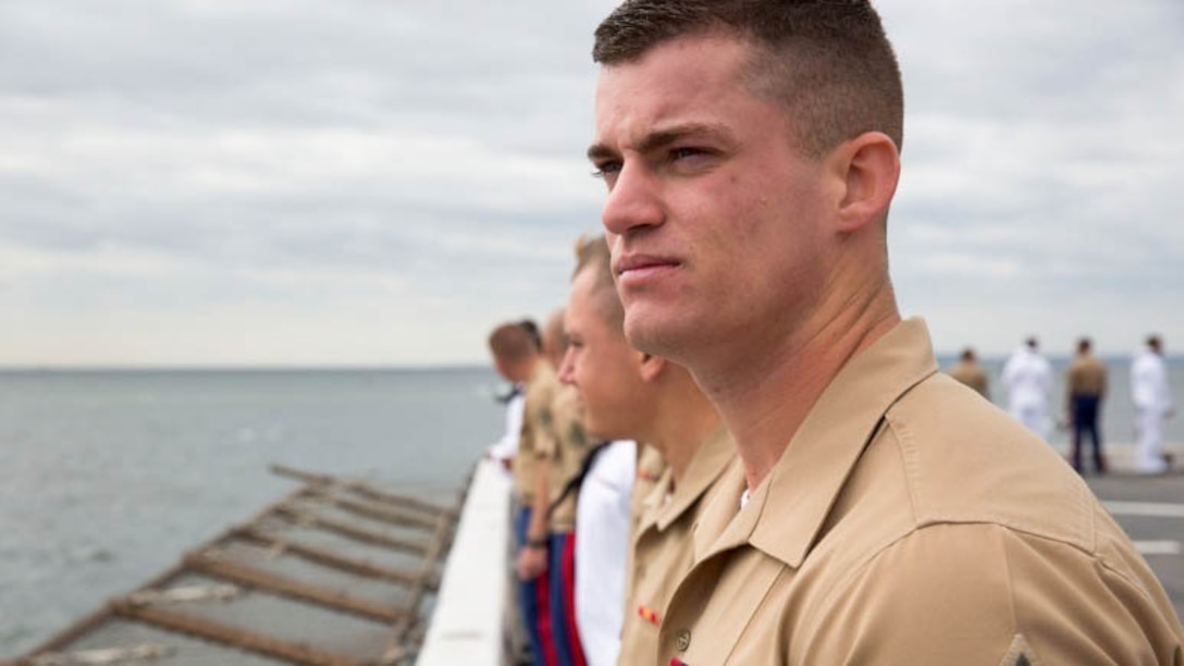 Marines and sailors man the rails as the USS San Antonio makes its final approach into New York, May 20, 2015. Approximately 1,800 Marines, sailors and Coast Guardsmen participate in this year’s annual Fleet Week New York, May 20-26, 2015. Fleet Week provides the people of New York and surrounding area a chance to see the capabilities of the sea services, as well getting the opportunity to meet the Marines, sailors and Coast Guardsmen. 