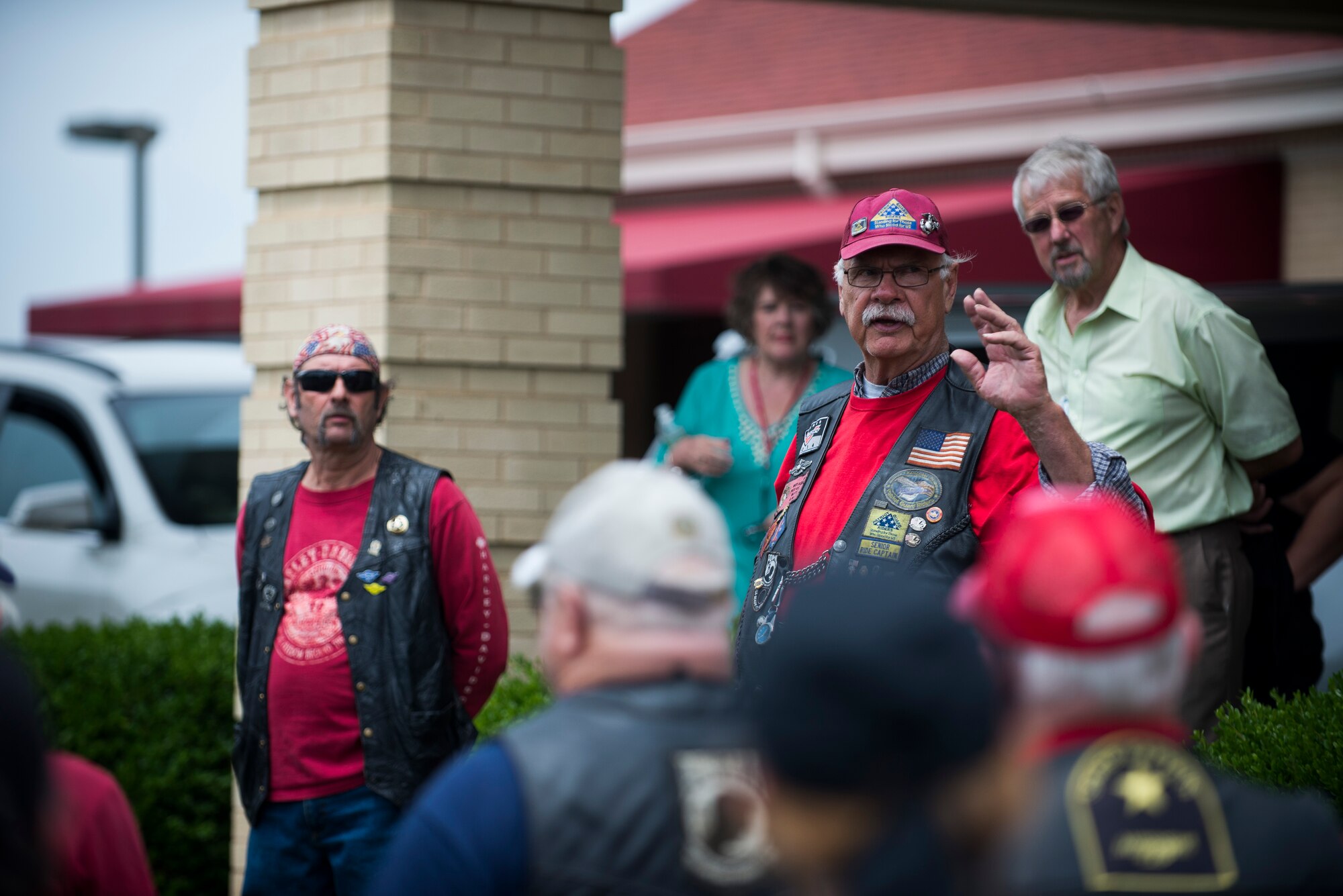 Robert Smith, senior ride captain of the Patriot Guard Riders, speaks to gathered supporters before the funeral for Tech. Sgt. Louis Clever May 22, 2015, at the Kutis Funeral Home, St. Louis, Missouri. Riders came from Missouri, Illinois and Alabama to support the Clever family. (U.S. Air Force photo by Staff Sgt. Clayton Lenhardt/Released)