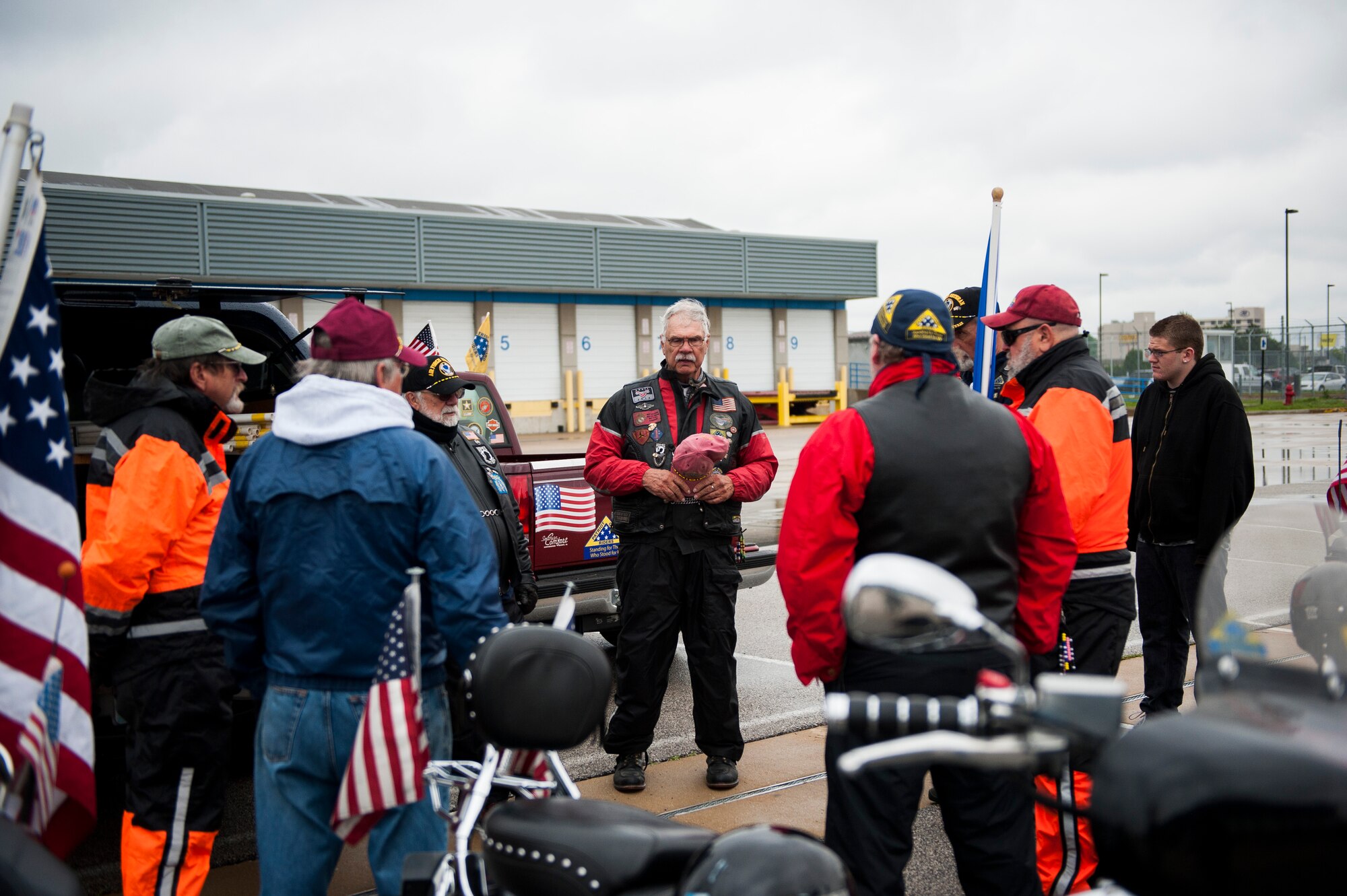 Members of the Patriot Guard Riders wait for the arrival of Tech. Sgt. Louis Clever's remains May 20, 2015, at Lambert–St. Louis International Airport, Missouri. Clever passed when his plane went down over Laos in 1969. (U.S. Air Force photo by Staff Sgt. Clayton Lenhardt/Released)