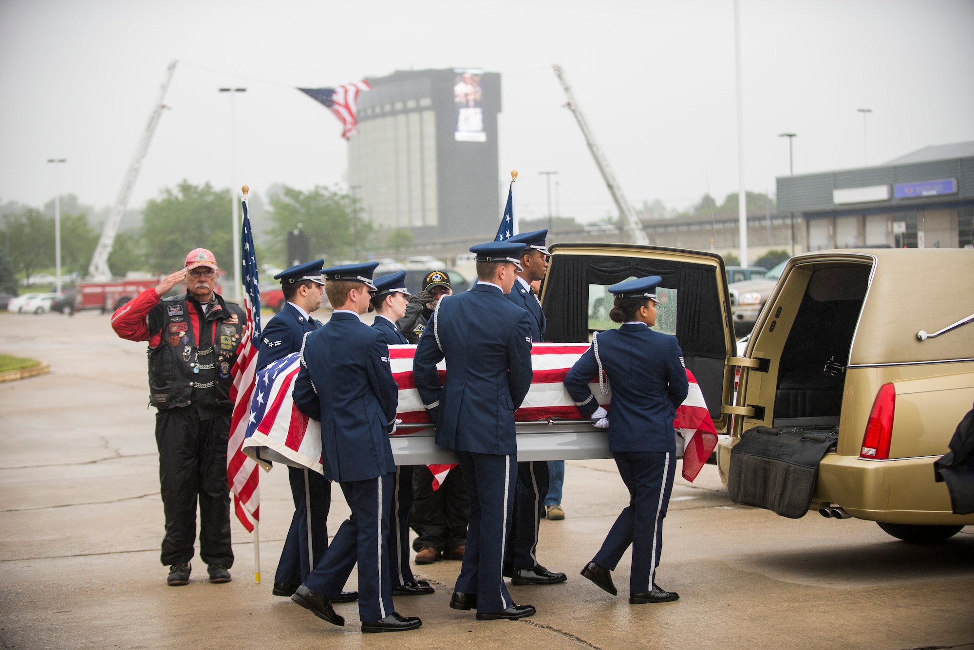 Members of Scott Air Force Base Honor Guard transport the casket of Tech. Sgt. Louis Clever May 20, 2015, at Lambert–St. Louis International Airport, Missouri. Clever's son, Paul, travelled to Laos to find the remains of his father. (U.S. Air Force photo by Staff Sgt. Clayton Lenhardt/Released)