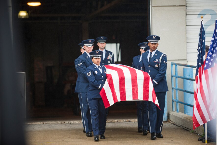 Members of Scott Air Force Base Honor Guard transport the remains of Tech. Sgt. Louis Clever May 20, 2015, at Lambert–St. Louis International Airport, Missouri. Clever passed when his plane went down over Laos in 1969. (U.S. Air Force photo by Staff Sgt. Clayton Lenhardt/Released)