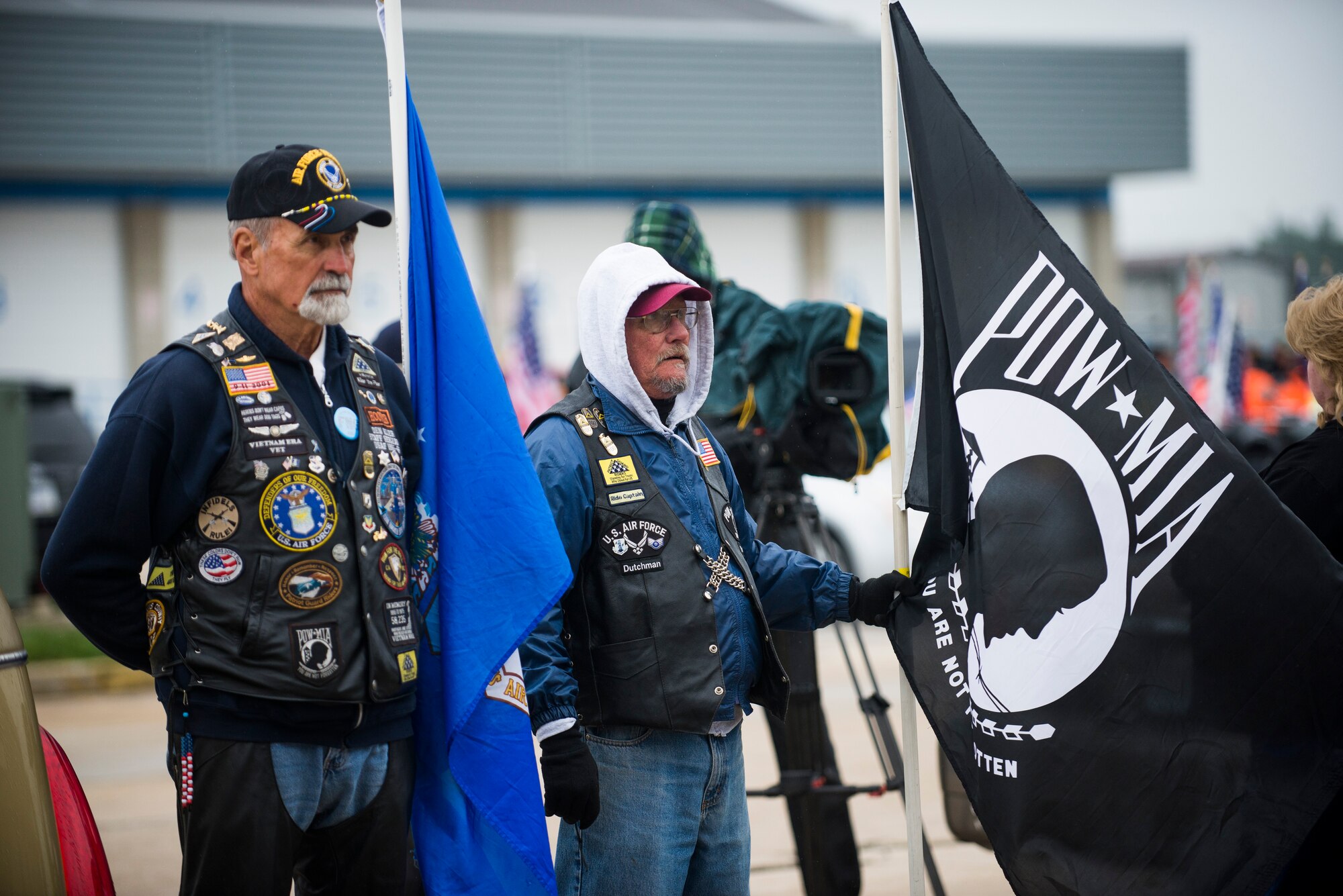 Members of the Patriot Guard Riders wait for the arrival of Tech. Sgt. Louis Clever's remains May 20, 2015, at Lambert–St. Louis International Airport, Missouri. Clever's son, Paul, travelled to Laos to find the remains of his father. (U.S. Air Force photo by Staff Sgt. Clayton Lenhardt/Released)