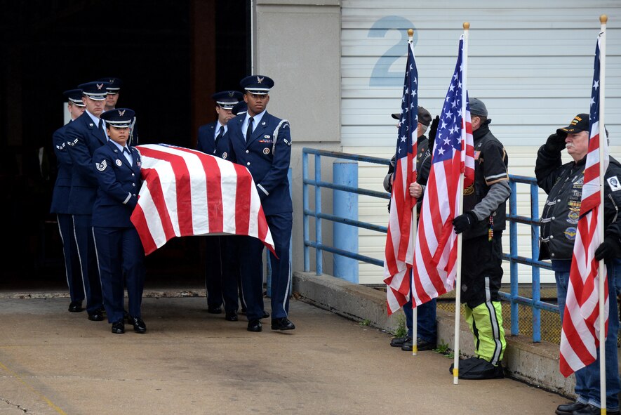 Scott Air Force Base Honorguardsmen carry the casket of Tech Sgt. Louis Clever from the St. Louis Lambert Airport to a hearse, May 20, 2015. Clever was a Vietnam War veteran who died in 1969. Remains from him were recently found, identified and were finally laid to rest. (U.S. Air Force Photo by Airman 1st Class Megan Friedl)