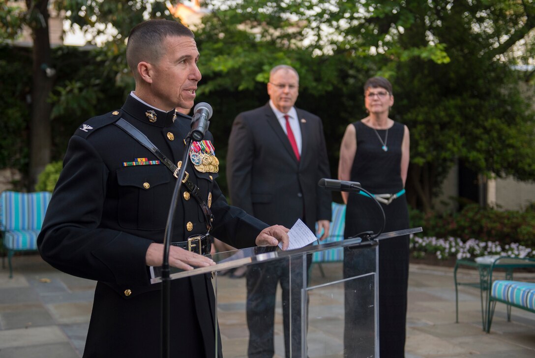 Marine Corps Barracks Commanding Officer Col. Benjamin T. Watson welcomes guests during the Evening Parade reception at Marine Barracks in Washington, D.C., May 22, 2015, where Deputy Defense Secretary Bob Work was the guest of honor.