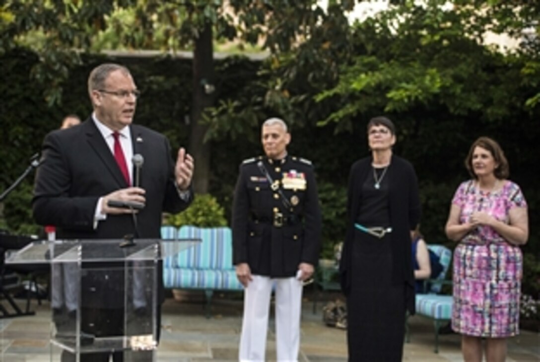 Deputy Defense Secretary Bob Work makes remarks during the Evening Parade reception at Marine Barracks in Washington, D.C., May 22, 2015, where he was the guest of honor. 