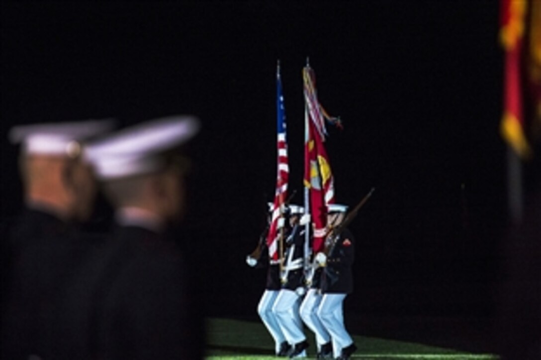 A Marine Corps color guard present the colors at the Evening Parade at Marine Barracks in Washington, D.C., May 22, 2015, where Deputy Defense Secretary Bob Work was the invited guest of honor.