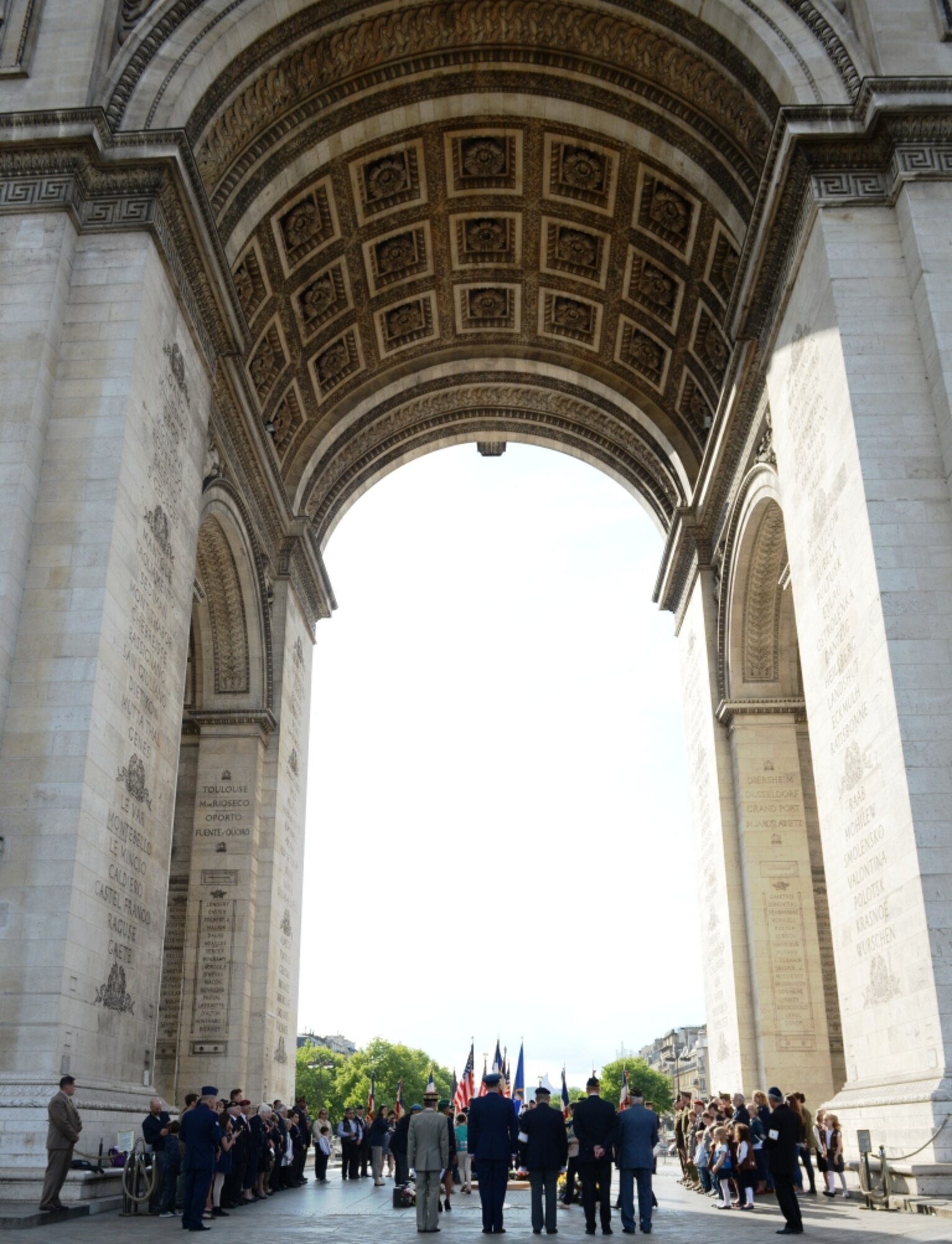Gen. Frank Gorenc, U.S. Air Forces in Europe - Air Forces Africa commander (center), stands by French dignitaries from the French Air Force and the American Legion to pay respects to the Tomb of the Unknown Soldier at the Arc de Triomphe in Paris, France, May 24, 2015. The Tomb of the Unknown Soldier is the resting place for a French service member who died during WWI. (U.S. Air Force photo by Maj. Sheryll Klinkel/Released)