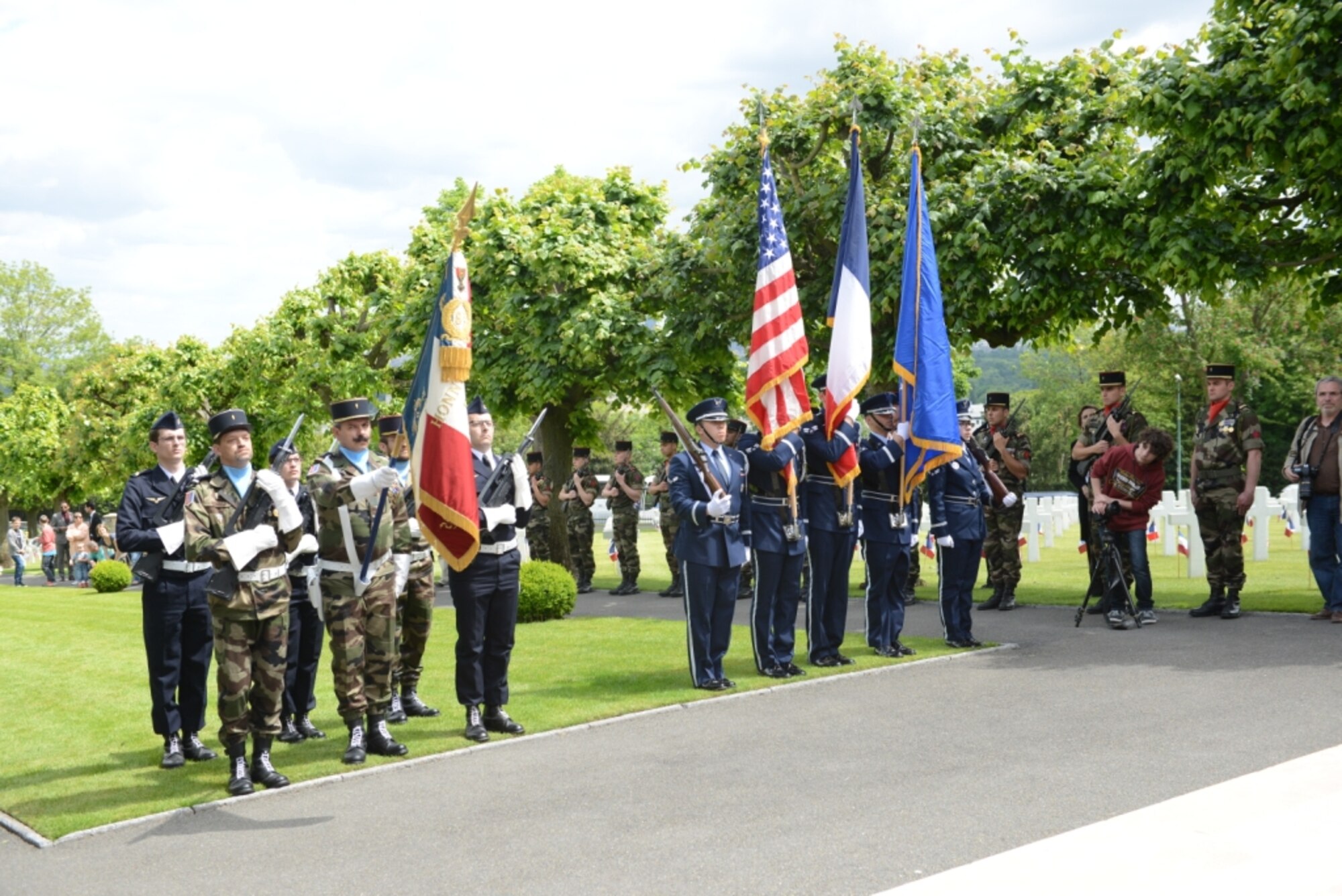 A Memorial Day ceremony at Suresnes American Cemetery, near Paris, France, honors fallen U.S. and French Soldiers, Sailors, Airmen, and Marines May 24, 2015. The cemetery contains the burials of 1,565 and 974 men and women missing in actions. The cemetery is the only American cemetery in Europe that shelters fallen comrades from both world wars.  (U.S. Air Force photo by Maj. Sheryll Klinkel/Released)