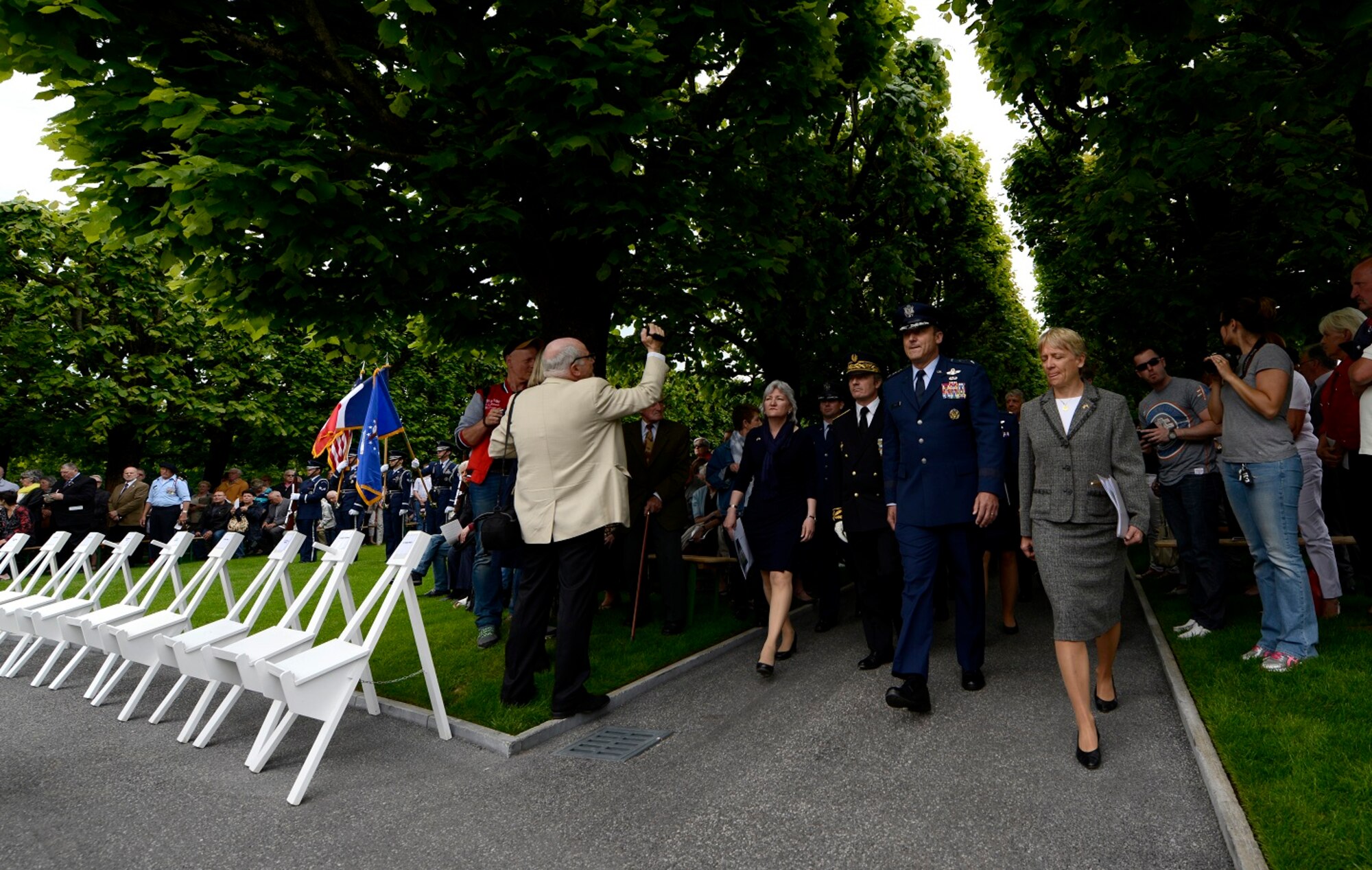 Lt. Gen. Tom Jones, U.S. Air Force in Europe and Air Forces Africa vice commander leads the official party as they arrive for a Memorial Day ceremony May 24, 2015, at St. Mihiel American Cemetery in Thiaucourt, France. The ceremony was one of many held throughout Europe during Memorial weekend to pay tribute to fallen servicemembers. (U.S. Air Force photo/Airman 1st Class Tryphena Mayhugh)