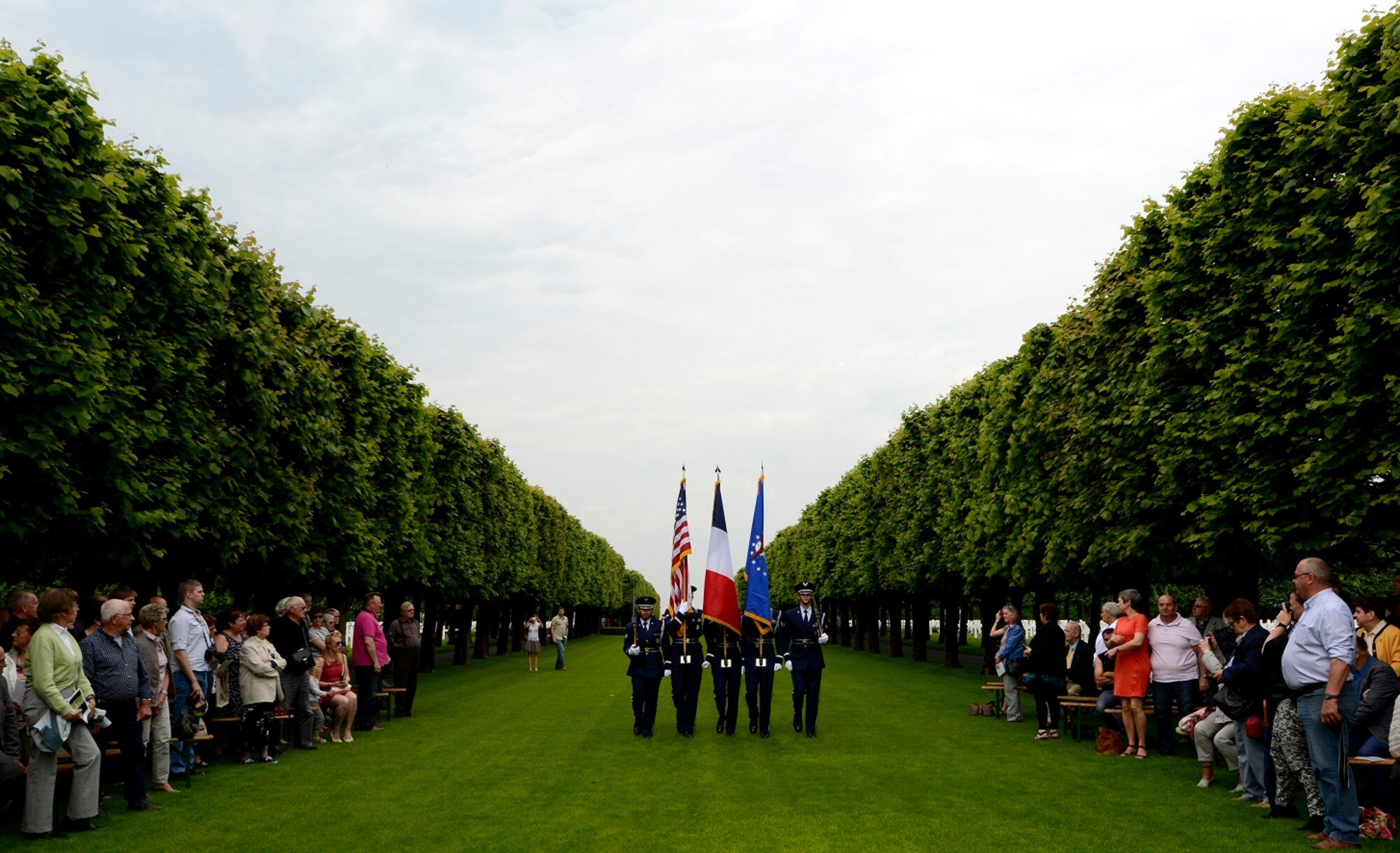 The 86th Airlift Wing Color Guard present the colors during a Memorial Day ceremony at St. Mihiel American Cemetery May 24, 2015, in Thiaucourt, France. More than 4,100 U.S. military members from World War I are buried in the cemetery where local community leaders gathered with U.S. Air Forces in Europe servicemembers to honor the fallen to commemorate Memorial Day. (U.S. Air Force photo/Airman 1st Class Tryphena Mayhugh)