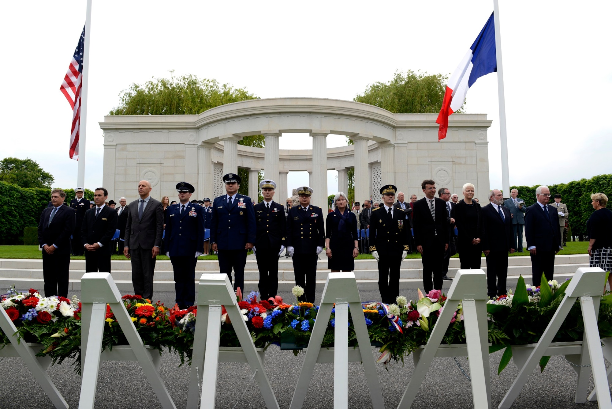 American and French military and community leaders prepare to place wreaths on the graves of fallen servicemembers during a Memorial Day ceremony May 24, 2015, at St. Mihiel American Cemetery in Thiaucourt, France. The cemetery is home to more than 4,100 military members who lost their lives during World War I. (U.S. Air Force photo/Airman 1st Class Tryphena Mayhugh)