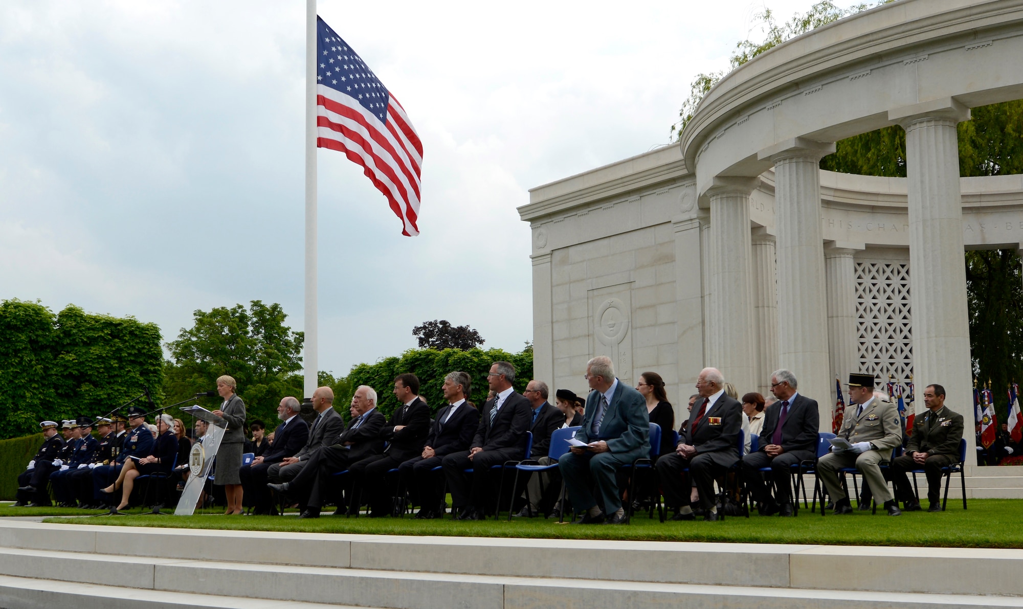 Ms. Lilian Pfluke, master of ceremony and American War Memorials Overseas founder, provides the introductory remarks during a Memorial Day ceremony May 24, 2015, at St. Mihiel American Cemetery in Thiaucourt, France. The cemetery is home to more than 4,100 servicemembers who lost their lives during World War I. (U.S. Air Force photo/Airman 1st Class Tryphena Mayhugh)