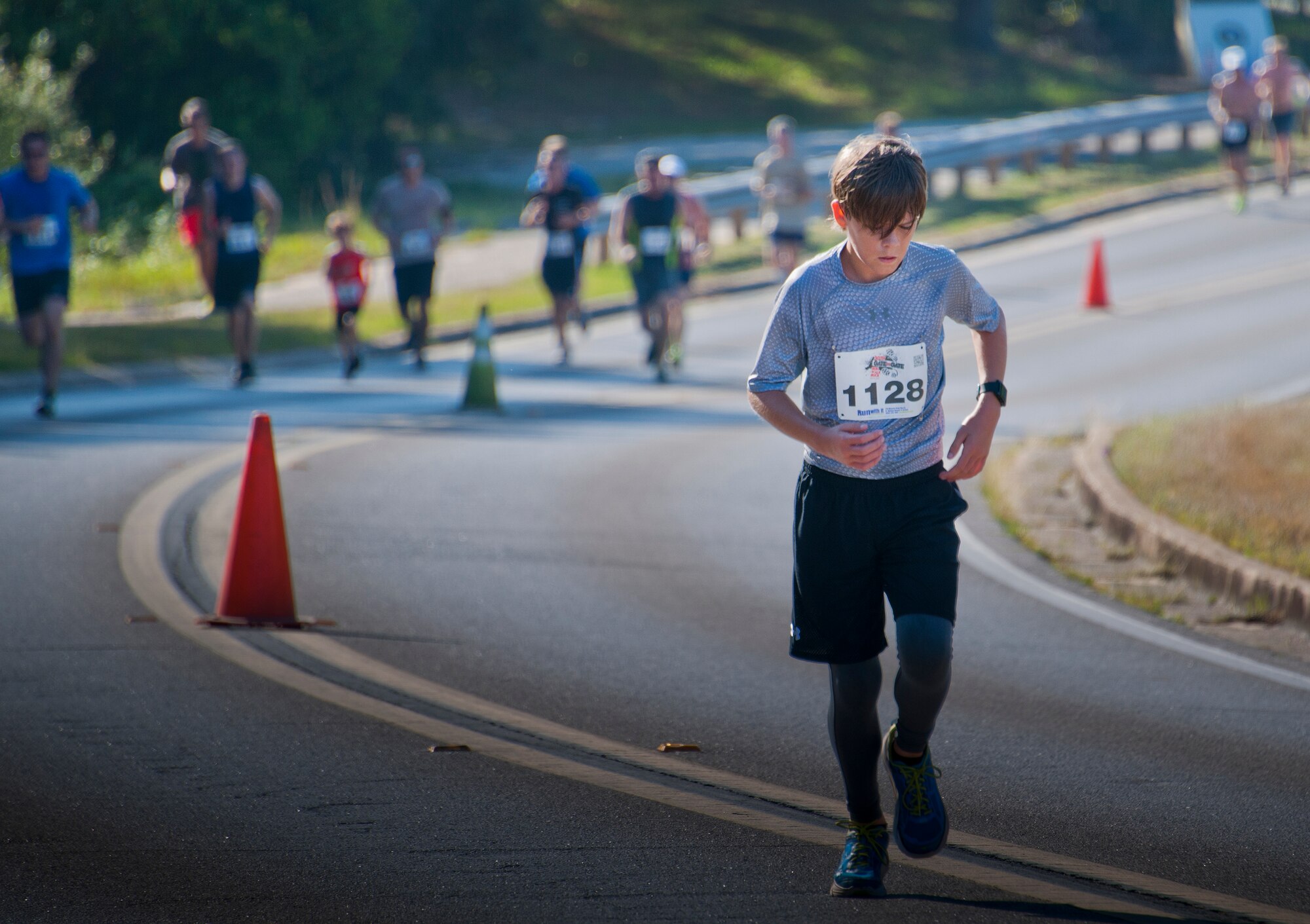 Austin Vandyne climbs the final hill toward the finish line during the 30th Anniversary Memorial Gate to Gate run May 23 at Eglin Air Force Base, Fla.  More than 1,500 participated in this year’s event.  (U.S. Air Force photo/Samuel King Jr.)