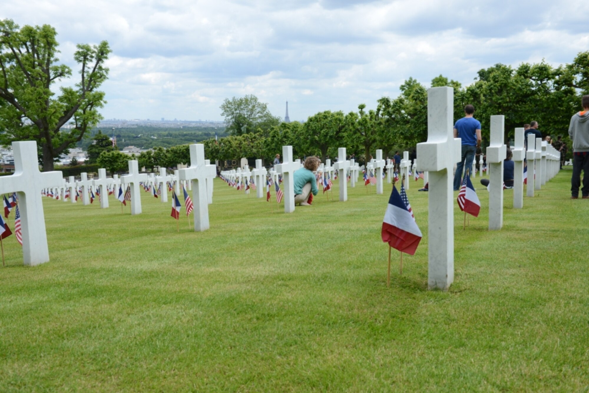 A Memorial Day ceremony at Suresnes American Cemetery, near Paris, France, honors fallen U.S. and French Soldiers, Sailors, Airmen, and Marines May 24, 2015. The cemetery contains the burials of 1,565 and 974 men and women missing in actions. The cemetery is the only American cemetery in Europe that shelters fallen comrades from both world wars.  (U.S. Air Force photo by Maj. Sheryll Klinkel/Released)