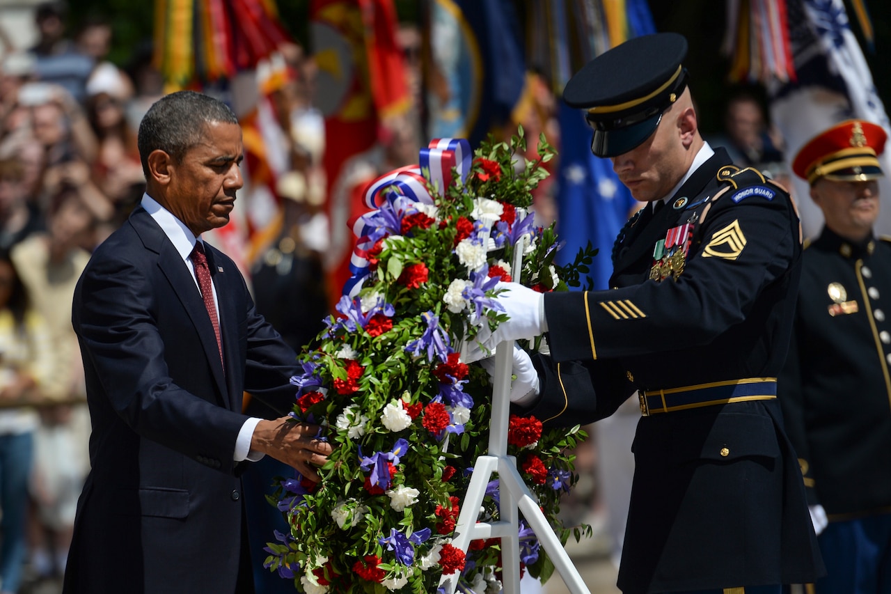 President Barack Obama lays a wreath at the Tomb of the Unknown Soldier to observe Memorial Day at Arlington National Cemetery in Arlington, Va., May 25, 2015. DoD photo by EJ Hersom