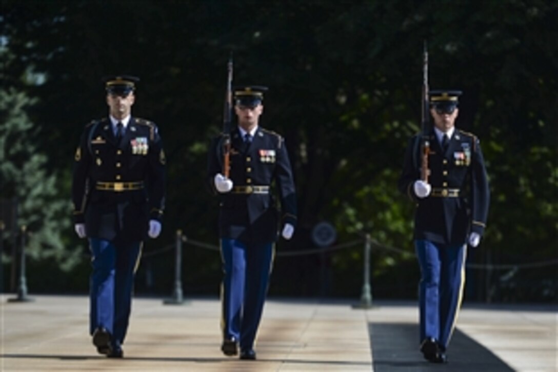 Soldiers perform the changing-of-the-guard ceremony on Memorial Day at Arlington National Cemetery in Arlington, Va., May 25, 2015.
