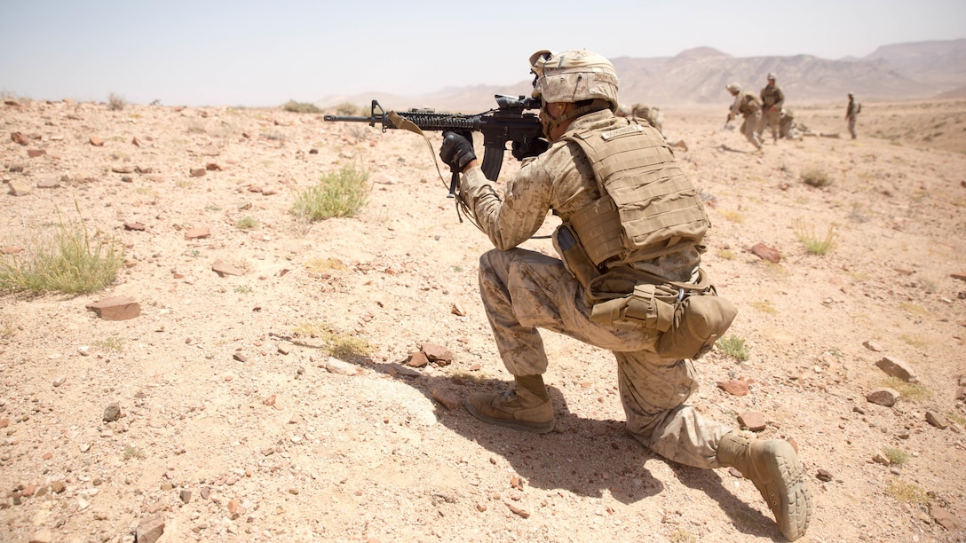 A U.S. Marine from Easy Company, 2nd Battalion, 2nd Marine Regiment, fires downrange during the last live-fire event of Eager Lion 15 around Al Quweyrah, Jordan, May 19, 2015.  Exercise Eager Lion 15 is a multinational exercise designed to strengthen military-to-military relationships, increase interoperability between partner nations, and enhance regional security and stability. Eager Lion takes place annually in the Hashemite Kingdom of Jordan, with more than 10,000 military participants from 18 countries and NATO. 