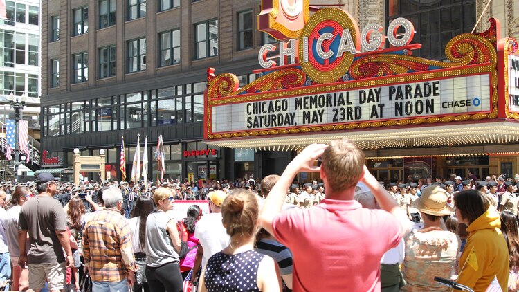 Junior Reserve Officer Training Corps students recreate the flag raising on Mount Suribachi as part of their float during the 2015 Chicago Memorial Day Parade May 23, 2015 in Chicago, Illinois. The annual parade is considered one of the largest in the nation and attracts thousands of visitors each year to remember those who have paid the ultimate sacrifice for American freedom.