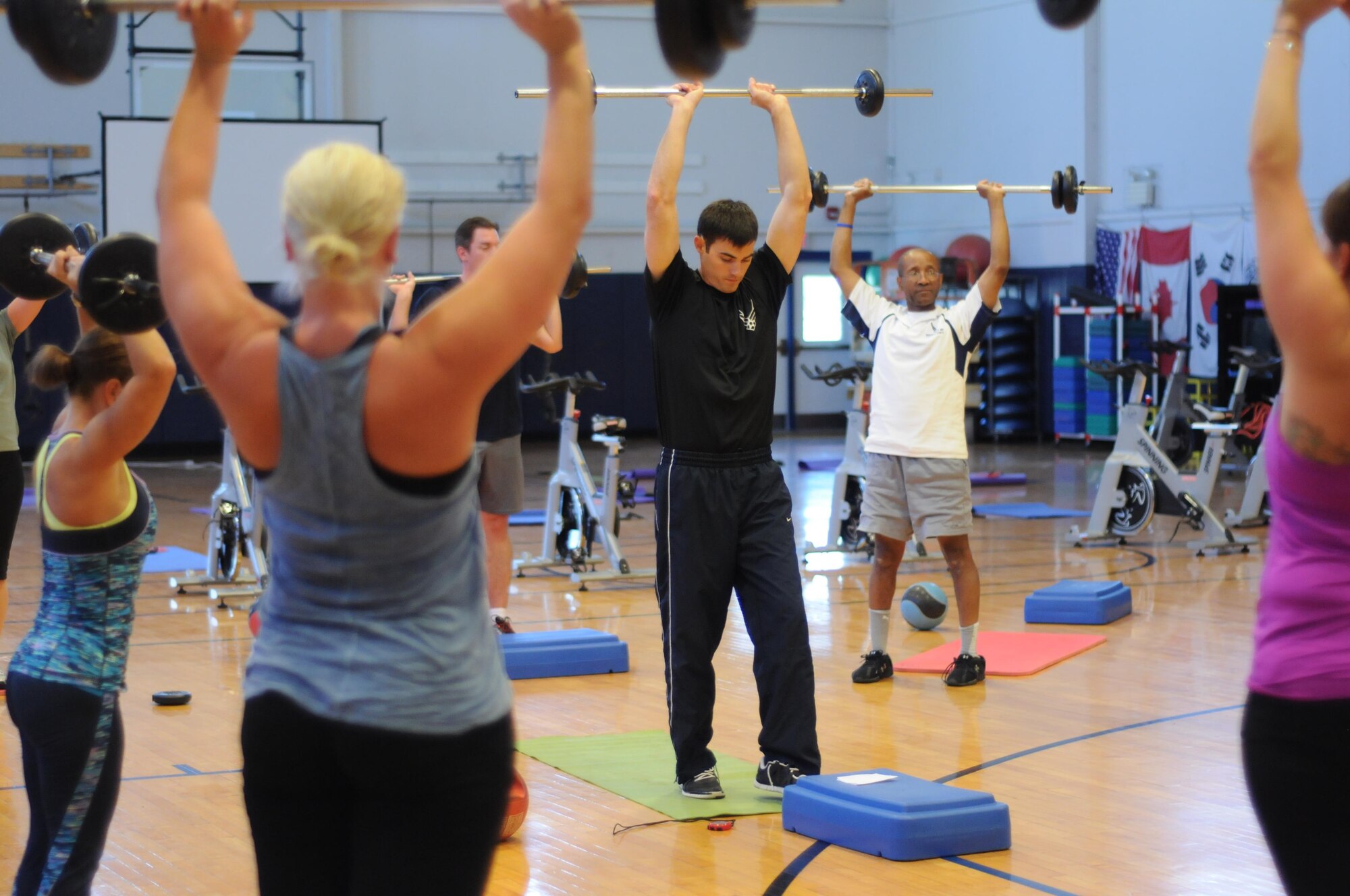 Members of the Niagara Falls Air Reserve Station participate in National Employee Fitness Day at the base fitness center on May 20, 2015. Personnel performed different exercises during the organized event. (U.S. Air Force photo by Staff Sgt. Matthew Burke)
