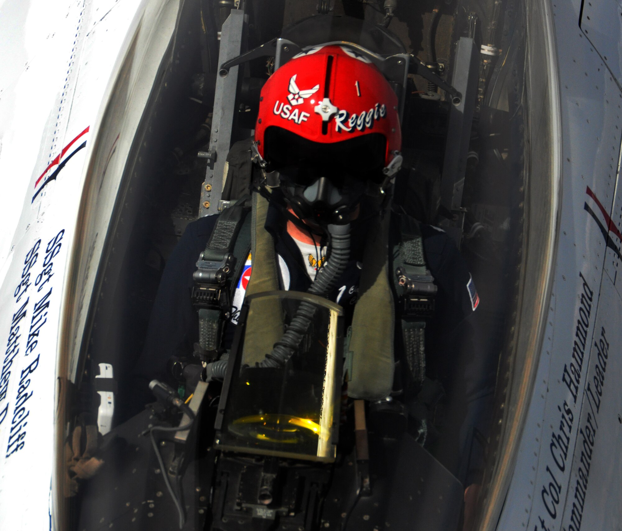 Lt. Col. Christopher Hammond, commander/leader of the U.S. Air Force Thunderbird Demonstration Squadron, peers up from the canopy of his F-16 Fighting Falcon aircraft while being refueled in flight by a KC-135 Stratotanker from McConnell Air Force Base, Kan., May 21, 2015. The KC-135 was one of two McConnell tankers providing cross-country air refueling support for the Thunderbirds. The KC-135 aircrews, all Air Force Reservists from the 931st Air Refueling Group, provided several air refuelings for the Thunderbirds, taking them from Nellis AFB, Nev., to Long Island MacArthur Airport, Islip, N.Y., ensuring the demonstration team made it to their May 23 flight demonstration at the Jones Beach Air Show in Wantagh, N.Y. (U.S. Air Force photo by Capt. Zach Anderson) 
