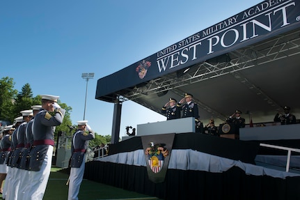 Gen. Martin E. Dempsey, 18th chairman of the Joint Chiefs of Staff, and ​Lt. Gen. Robert L. Caslen, Jr., the 59th Superintendent of the U.S. Military Academy at West Point, return salutes to the graduating class of 2015 at the U.S. Military Academy at West Point, N.Y., May 23, 2015. 