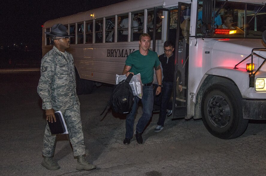 Tech. Sgt. Edroy Robinson, 331st Training Squadron military training instructor, directs newly arrived Air Force basic trainees May 20, 2015, at Joint Base San Antonio-Lackland, Texas. Military training instructors are vital to maintaining the world’s greatest Air Force. In 7 ½ weeks, MTIs transform America’s sons and daughters from civilians into Airmen by instilling discipline, attention to detail, esprit de corps and challenging them physically and mentally. (U.S. Air Force photo by Johnny Saldivar)