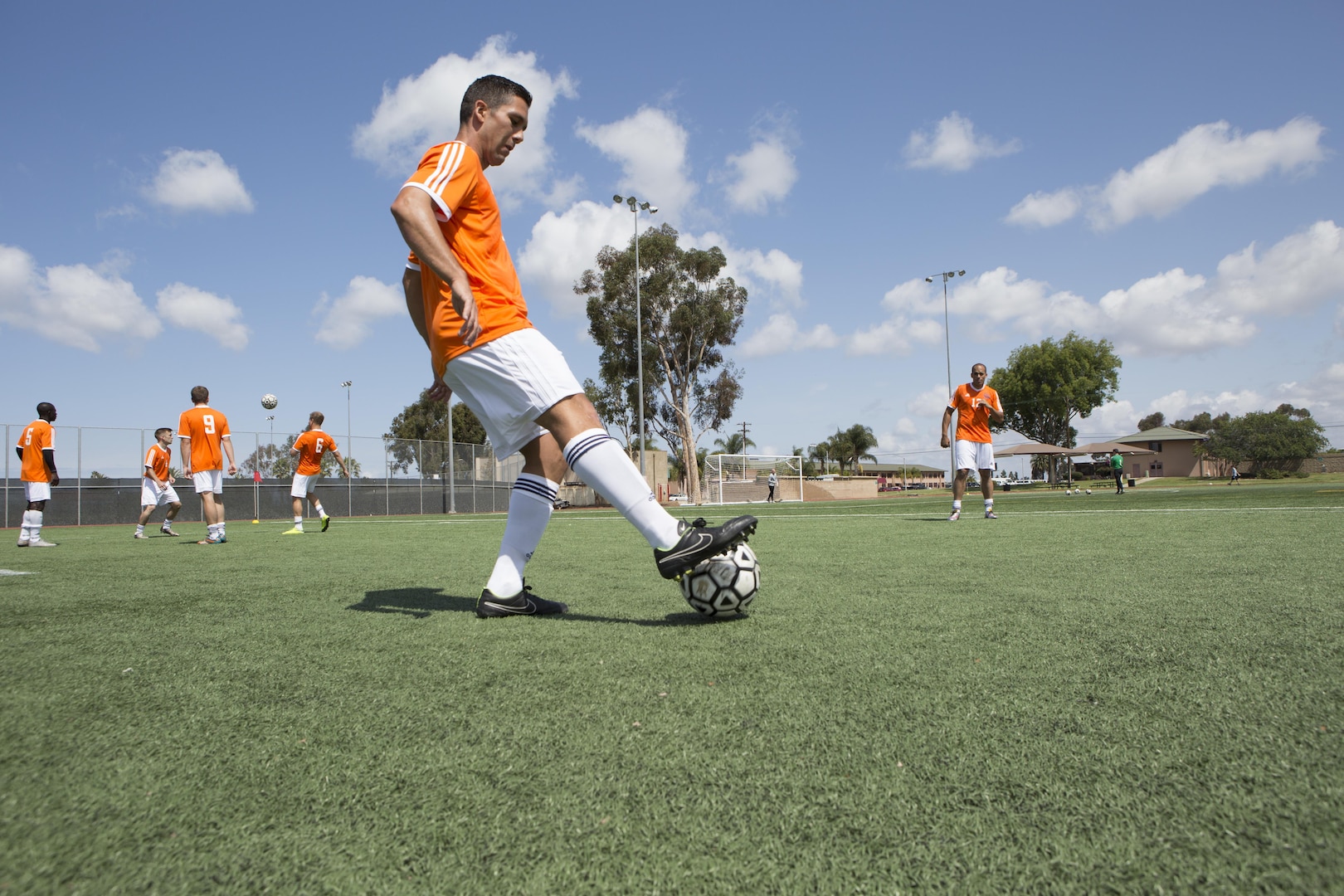 U.S. Armed Forces men's Navy soccer team warms up during the 2015 Armed Forces Men's Soccer Championship at the Miramar Sports Complex aboard Marine Corps Air Station Miramar, San Diego, Calif., May 14, 2015. The Armed Forces Champions are conducted by the Armed Forces Sports Council for the purpose of promoting understanding, good will and competition among the Armed Forces. (U.S. Marine Corps photo by Lance Cpl. Travis Jordan/Released)