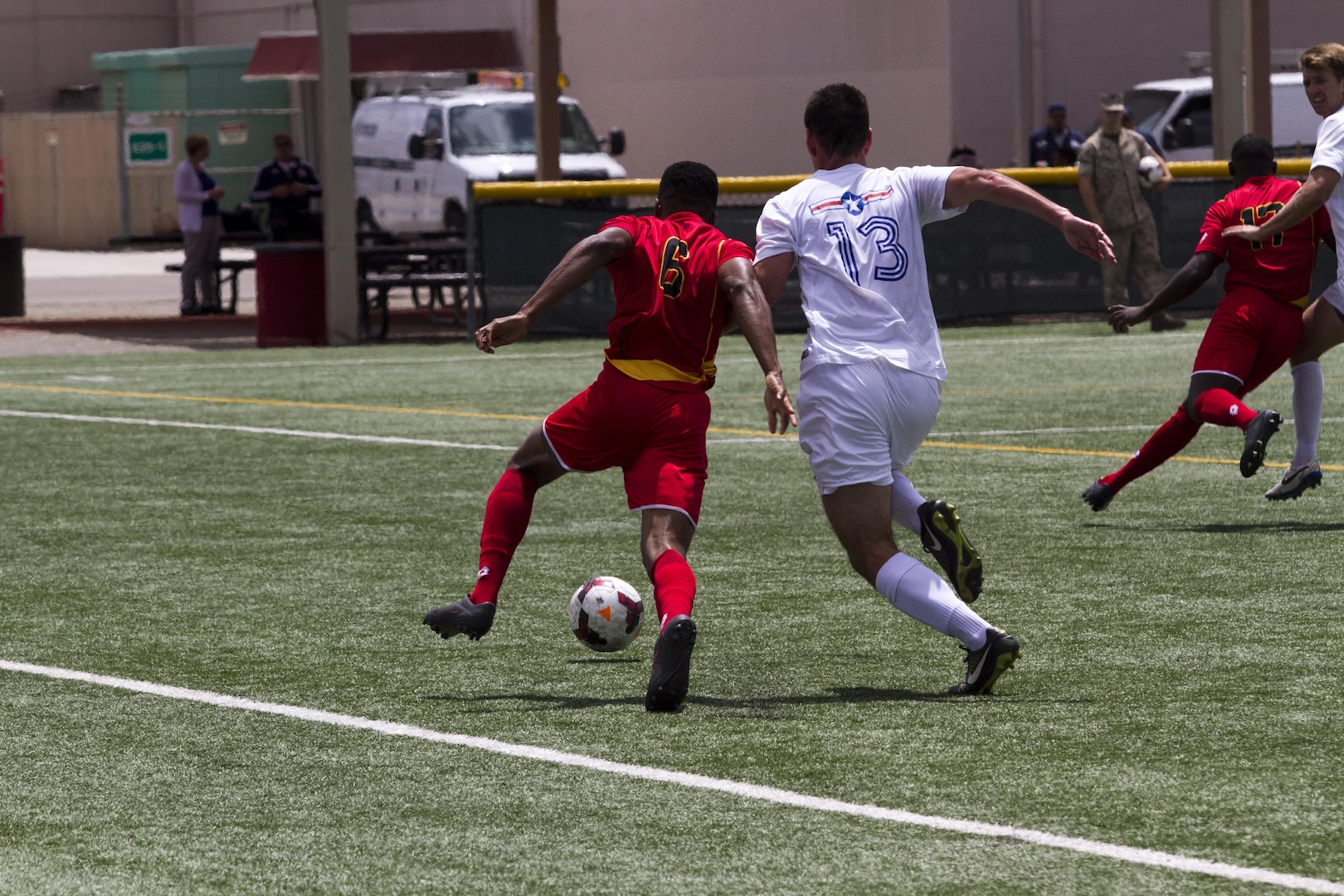 Members of the All-Marine and the Air Force soccer teams fight for the ball May 18 during a 2015 Armed Forces Soccer Championship game at Marine Corps Air Station Miramar, Calif. Representatives from each military branch participated in the championship.