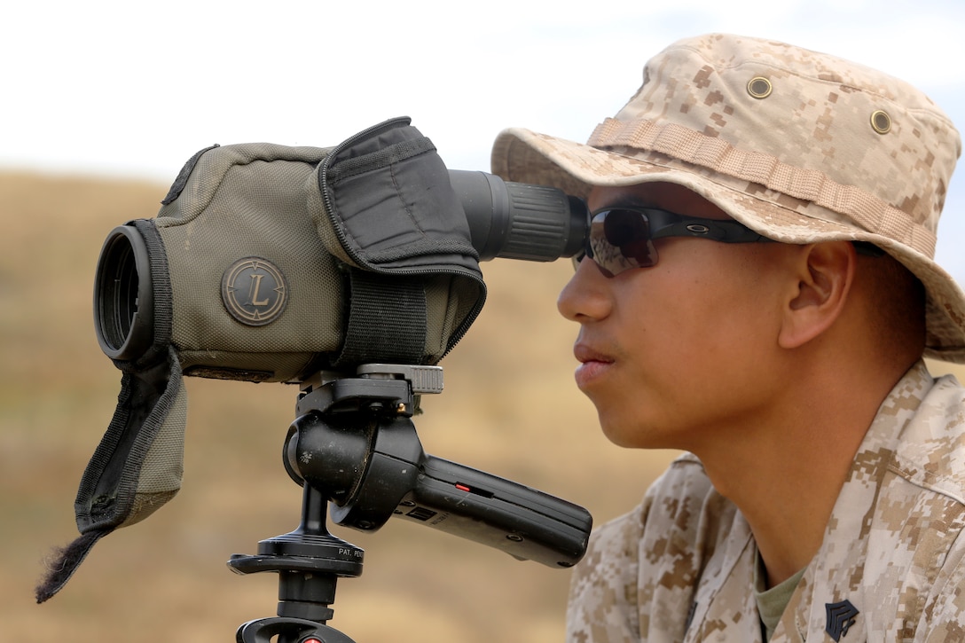 Staff Sgt. Daniel Ramos, an instructor with the Scout Sniper Course, Advanced Infantry Battalion, School of Infantry West, asses targets during a Scout Sniper Course training evolution, May 20. Ramos placed second against teams from the National Guard, Marine Corps, Air Force and foreign allied militaries during the 24th Armed Forces Skill at Arms Meeting Sniper Championship hosted by the National Guard Marksmanship Training Center at Fort Chaffee, Ark., April 18-25.