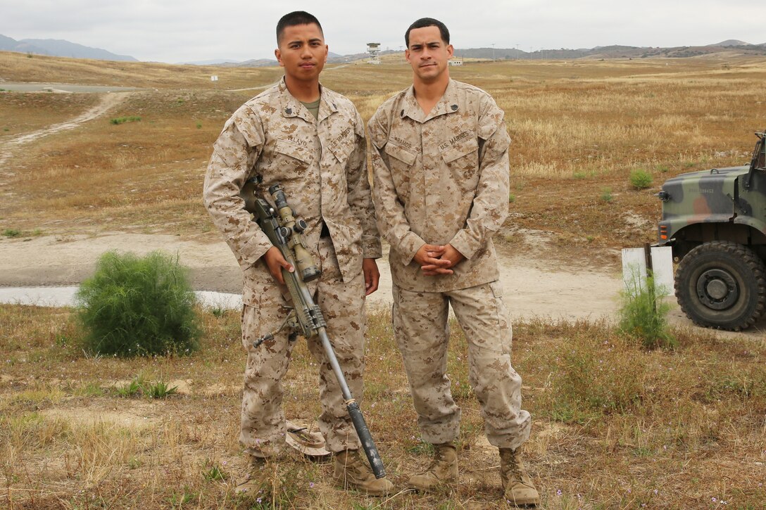 Staff Sgt. Daniel Ramos and Sgt. Emmanuel Velayo, instructors with the Scout Sniper Course, Advanced Infantry Battalion, School of Infantry West, pose for a photo, May 20. Ramos and Velayo placed second against teams from the National Guard, Marine Corps, Air Force and foreign allied militaries during the 24th Armed Forces Skill at Arms Meeting Sniper Championship hosted by the National Guard Marksmanship Training Center at Fort Chaffee, Ark., April 18-25.