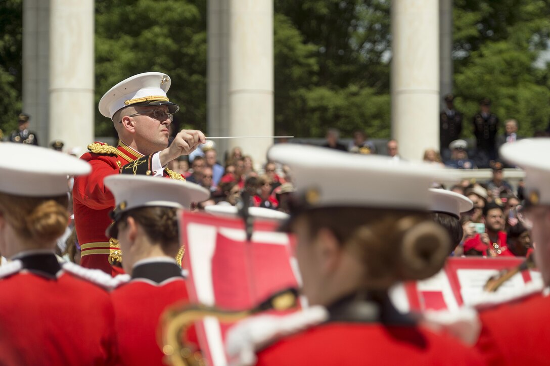 The Marine Corps Band performs during a Memorial Day Ceremony at the Arlington National Cemetery Amphitheater in Arlington, Va., May 25, 2015. (Photo by Master Sgt. Adrian Cadiz)(Released)