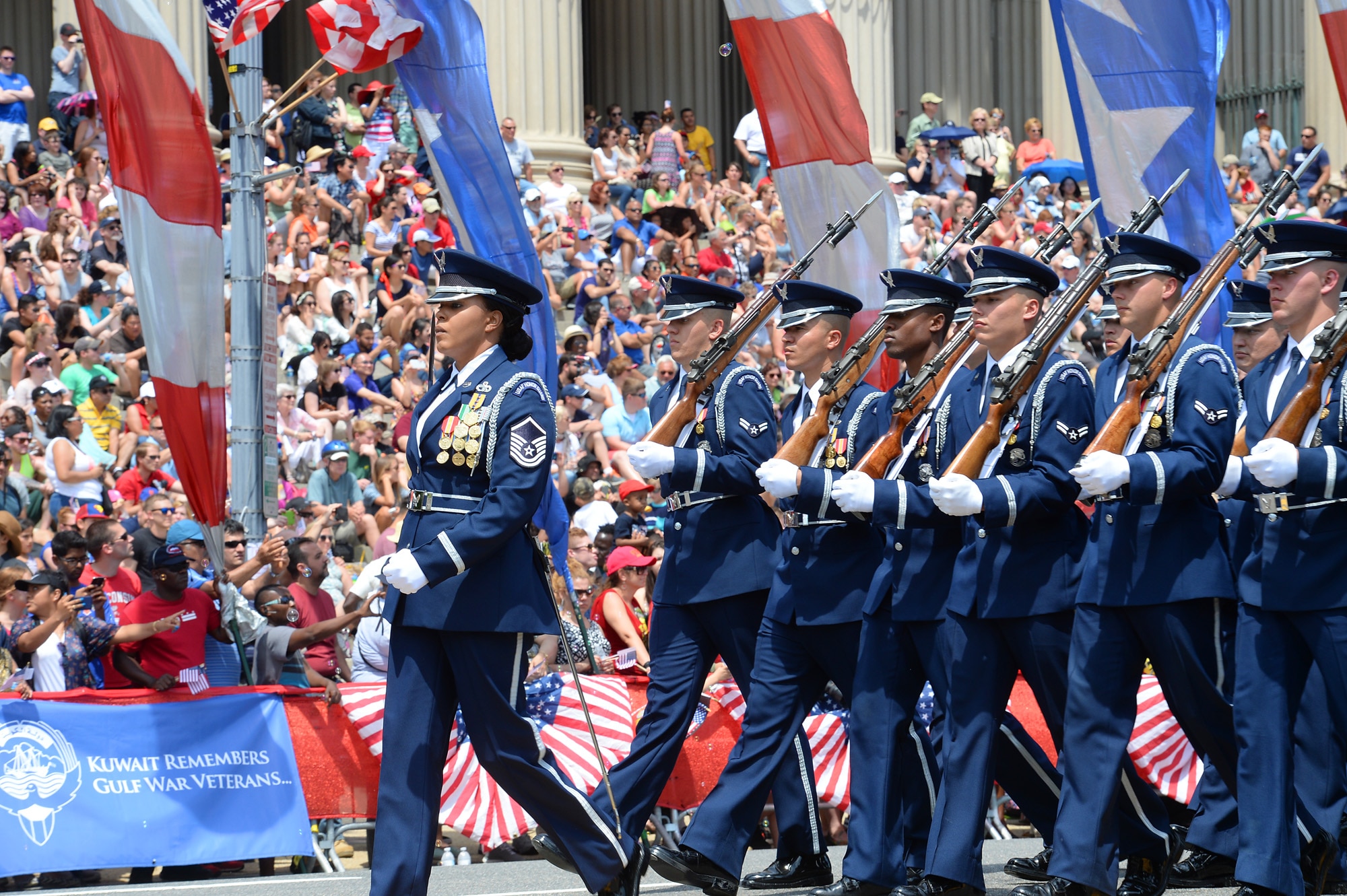 The U.S. Air Force Honor Guard marches during the National Memorial Day Parade in Washington, D.C., May 25, 2015. The National Memorial Day Parade was first launched in 2005 by the American Veterans Center in Washington. (U.S. Air Force photo/Scott M. Ash)