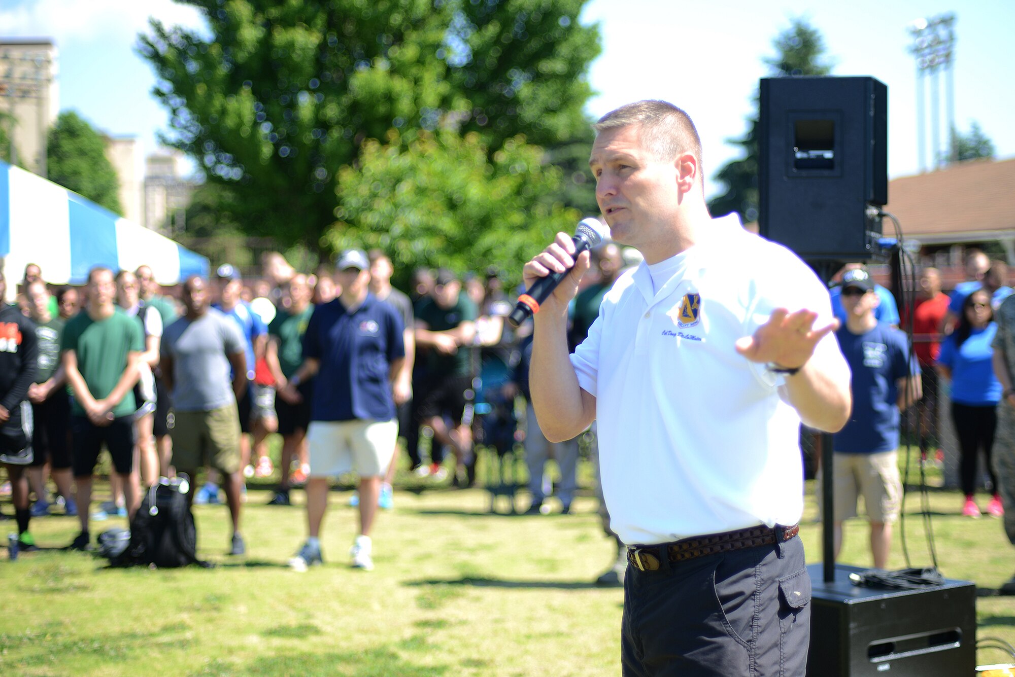Col. Douglas DeLaMater, 374th Airlift Wing commander, gives a speech during Airman Appreciation Day at Yokota Air Base, Japan, May 21, 2015. DeLaMater hosted the day to represent the appreciation he and other commanders on base have for the work Airmen conduct every day. (U.S. Air Force photo by Airman 1st Class David C. Danford/Released)
