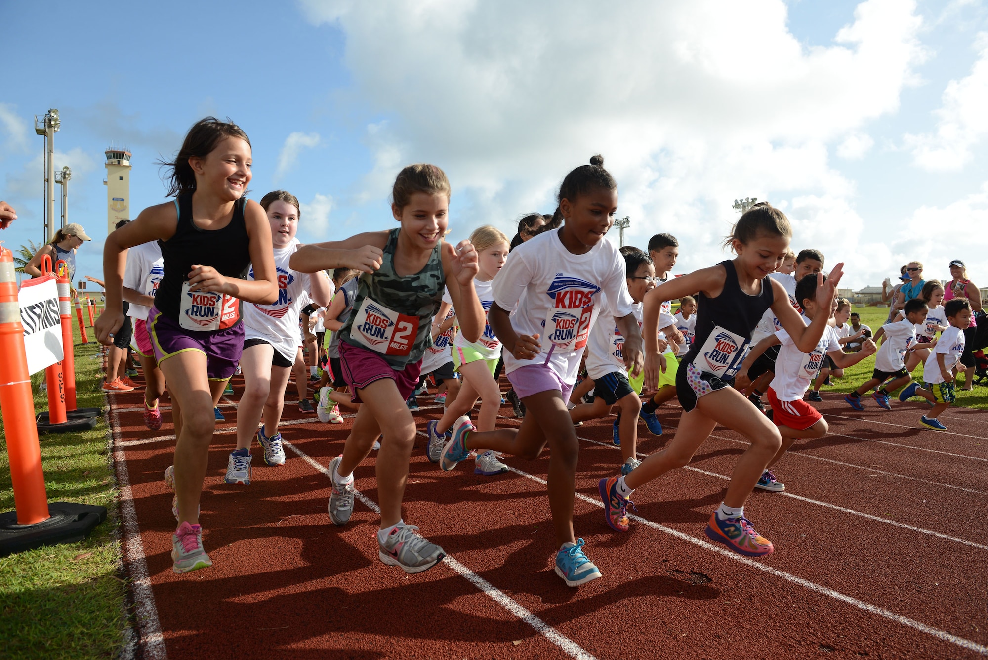 Children begin the America’s Kids Run May 25, 2015, at Andersen Air Force Base, Guam. Approximately 100 children and adults participated in the run in connection with Armed Forces Day activities. (U.S. Air Force photo by Airman 1st Class Joshua Smoot/Released)