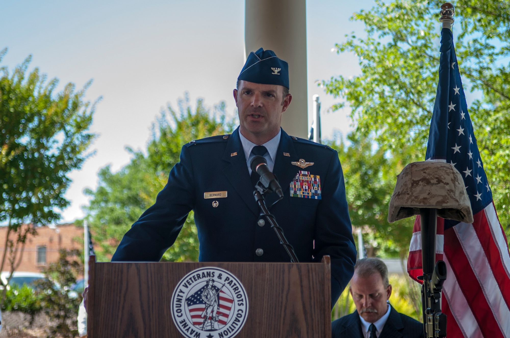Col. Andrew Bernard, 4th Fighter Wing vice commander, gives opening remarks  during the National Moment of Silence ceremony on Memorial Day, May 25, 2015, in Goldsboro, North Carolina. Members of the Wayne County Veterans and Patriots Coalition, the Watkins Gold Star family, and residents of the local area gathered to honor the memory of America’s fallen service members. (U.S. Air Force photo/Airman Shawna L. Keyes)