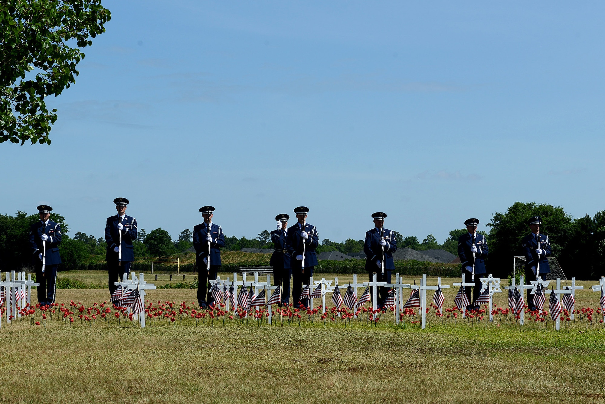 20th Force Support Squadron Honor Guardsmen prepare for a rifle salute during a Memorial Day ceremony at the Mabry Memorial in Sumter, South Carolina, May 25, 2015. The rifle salute was rendered during the ceremony to honor those who lost their lives in combat. (U.S. Air Force photo by Senior Airman Diana M. Cossaboom/Released)