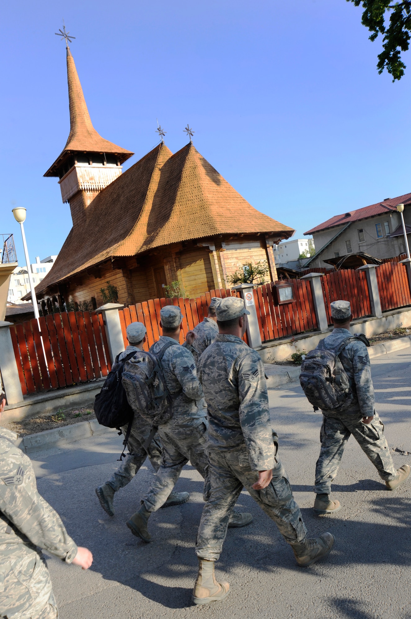 Airmen from the Oregon Air National Guard’s 142nd Fighter Wing Civil Engineer Squadron enjoy the local architecture during a morning commute to the construction site at a local health clinic in the city of Mangalia, Romania, May 12, 2015, as part of the U.S. European Command’s (EUCOM) Humanitarian Civic Assistance Program (HCA). The EUCOM HCA program is designed to improve the host nation's critical infrastructure and the underlying living conditions of the civilian populace. (U.S. Air National Guard photo by Tech Sgt. John Hughel, 142nd Fighter Wing Public Affairs/Released)